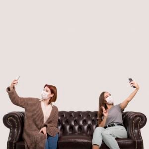 front view women sitting sofa